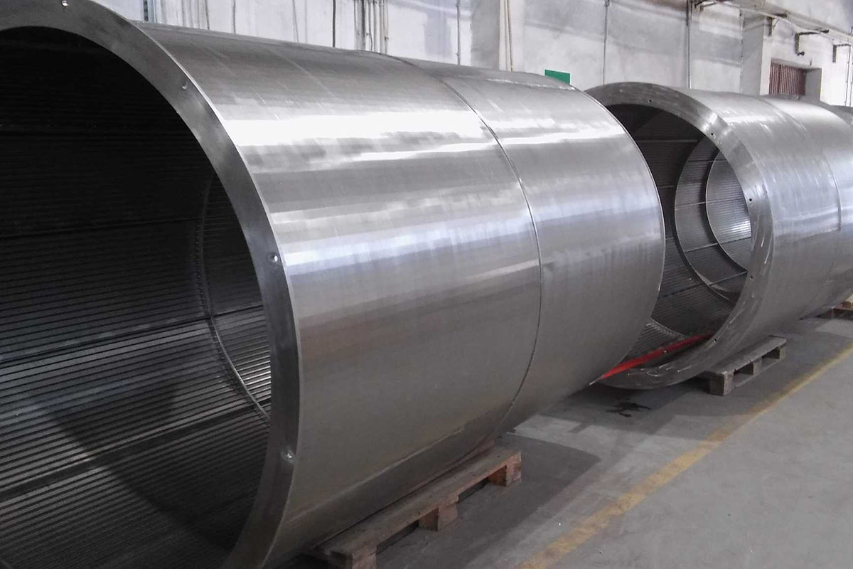 Cylindrical screen assemblies showing metal housings and internal profile-wire surfaces